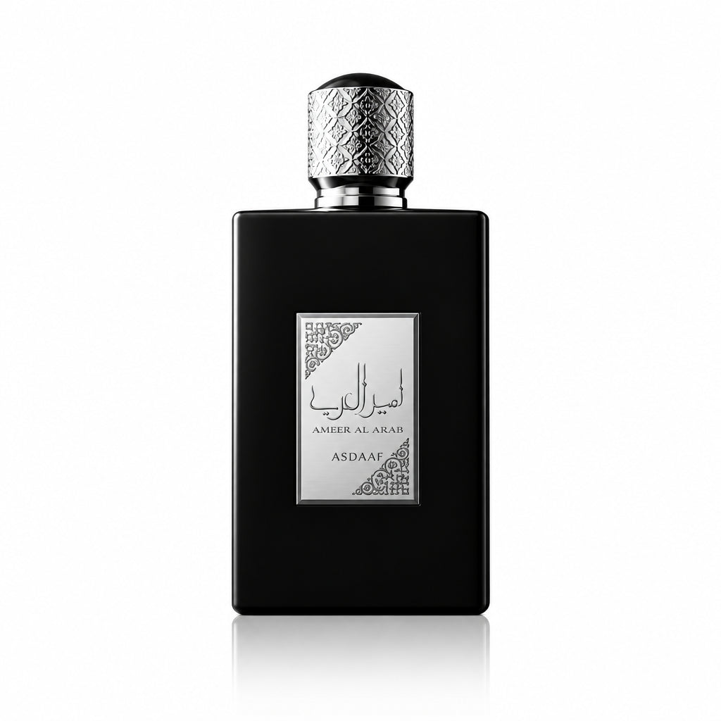 Black perfume bottle with silver cap on a white background