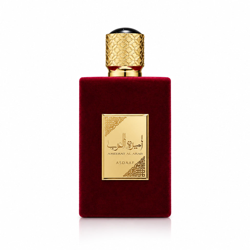 Red perfume bottle with gold cap and label on a white background
