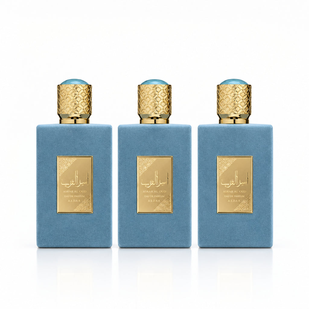 Perfume bottle with gold cap and label on a white background