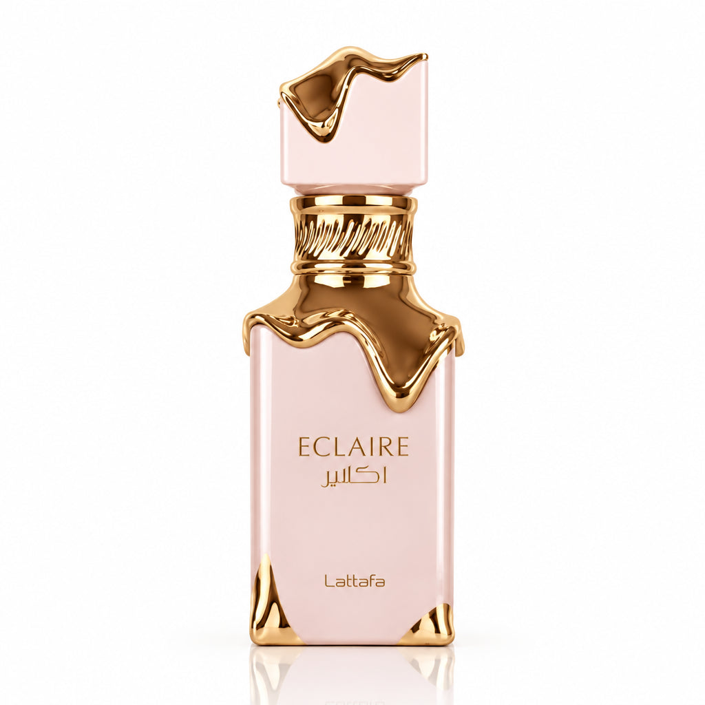 Perfume bottle with gold cap and 'Eclaire' branding on a white background