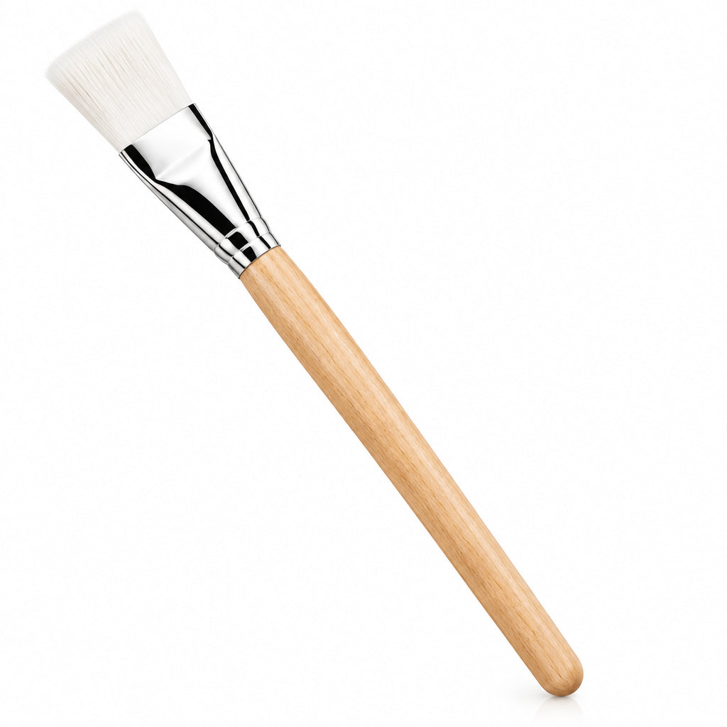 A flat brush with a light wood handle, white bristles, and a silver metal ferrule, shown on a white background with a circular close-up inset of the brush head and ferrule.