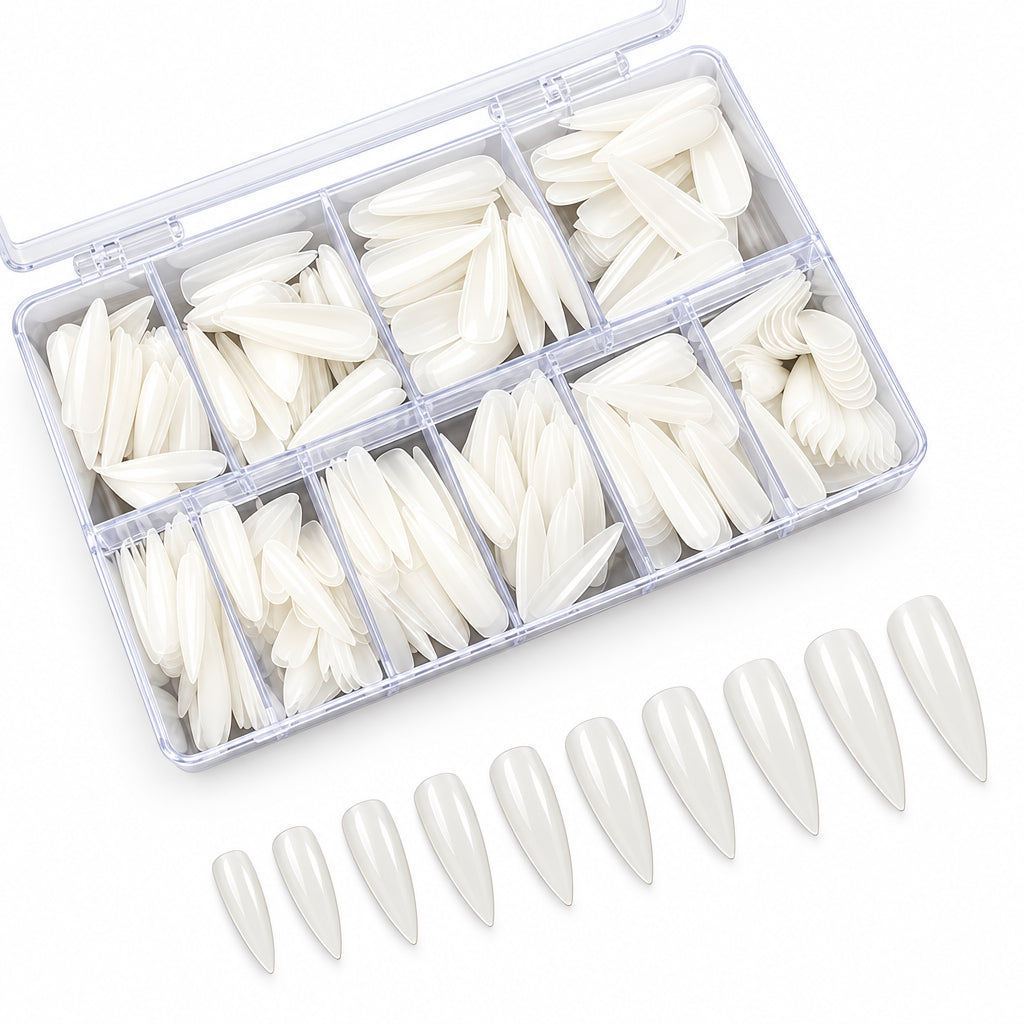 Set of white false nails in a clear storage box on a dark surface