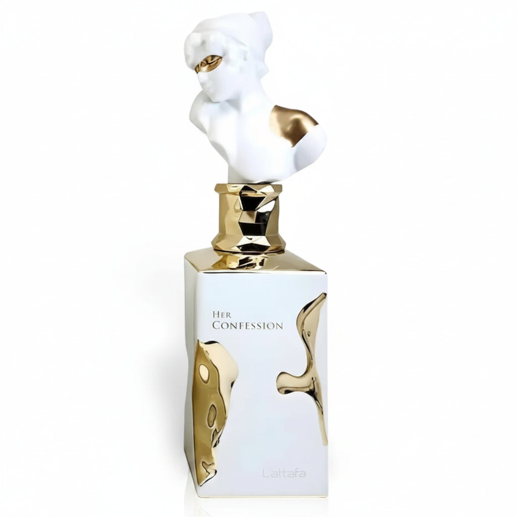 Perfume bottle with gold and white design on a white background