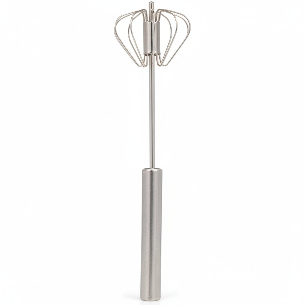 Metal whisk on a white background