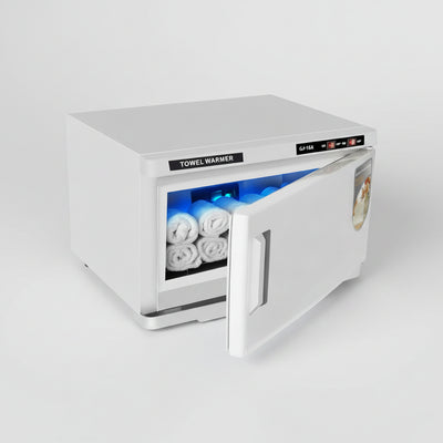 white UV towel warmer with its door open, showing white towels inside under blue UV light. The front has a black label reading 'TOWEL WARMER' and a digital control panel, with a small product sticker on the door.