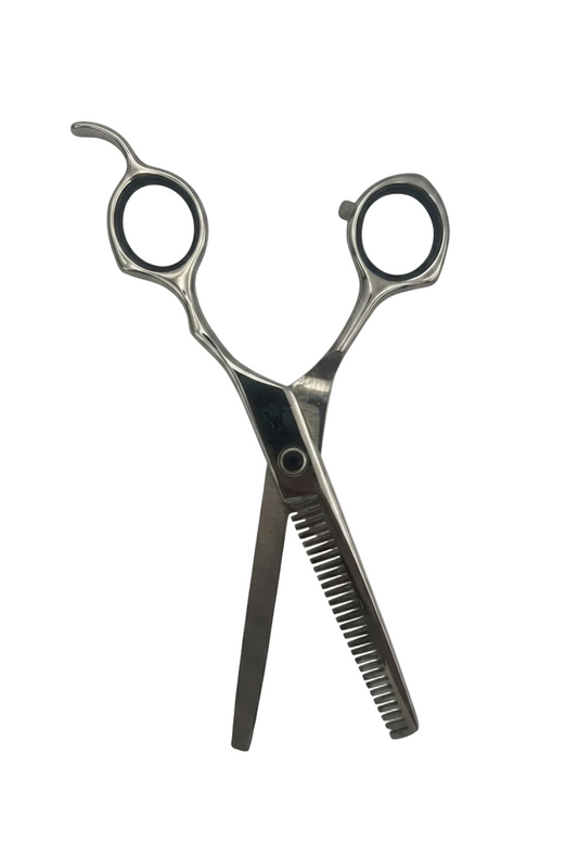 A pair of silver metal hair shears with a textured cutting edge and black ring handles, shown against a plain white background with a soft drop shadow.