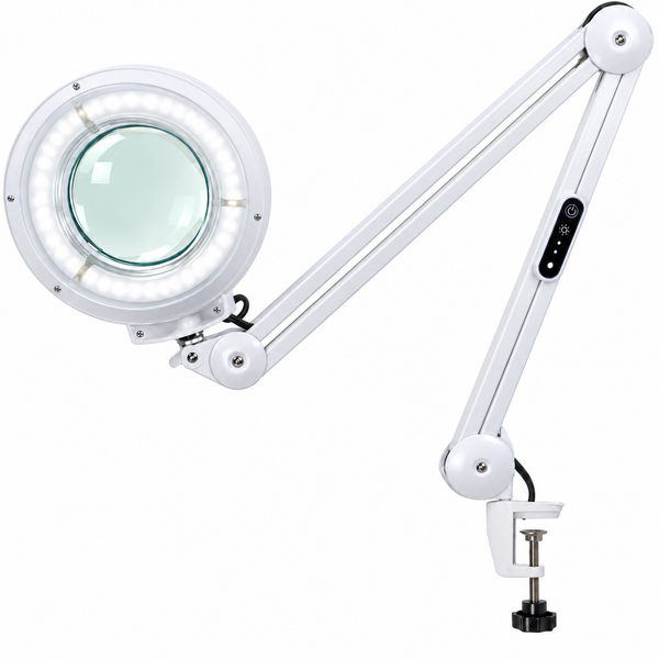 A silver adjustable magnifying lamp with a circular head, clear glass lens, and white clamp mount on a solid white background.