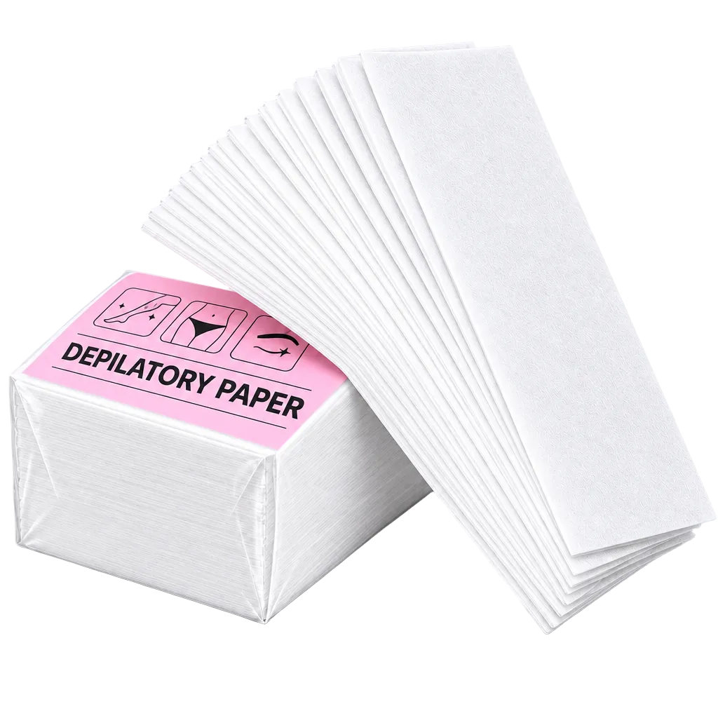 A stack of white disposable paper towels or napkins, with one folded corner opened to show the layered thickness, next to a small pink-labeled wrapped pack on a white background.