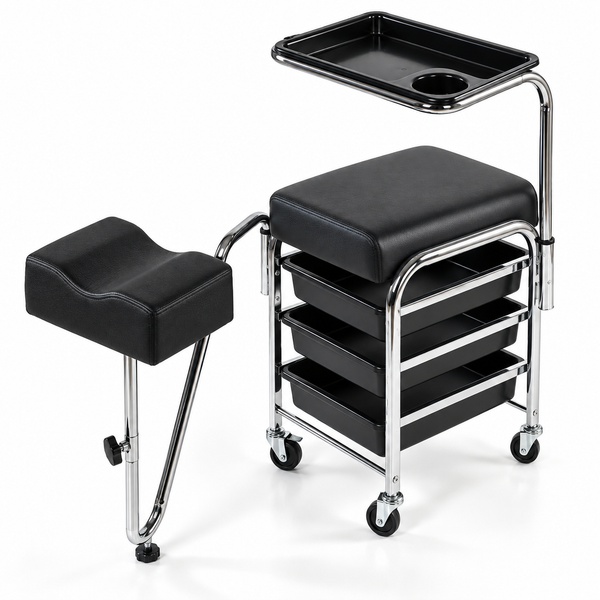 Black padded salon or spa treatment table with an attached matching footrest, three storage trays, and a chrome metal frame on casters, shown on a white studio background.