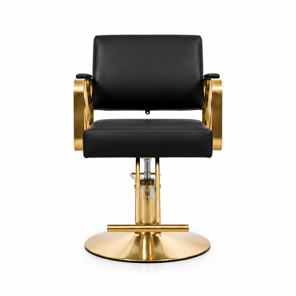 A modern salon barber chair with black leather upholstery and polished gold-finished metal frame and base, shown against a plain white background.