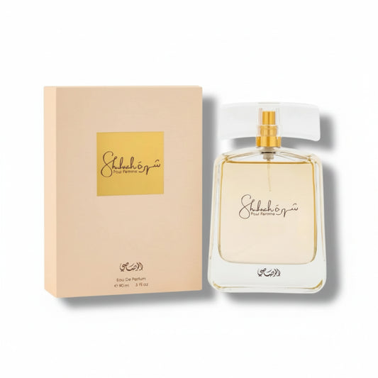 Perfume bottle and packaging with 'Shahin' branding on a white background