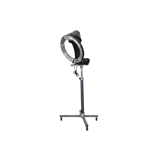 A professional hair extension or wig ring attachment stand, featuring a black padded headrest, a clear circular ring light, and a black metal stand with caster wheels, shown against a plain white background.